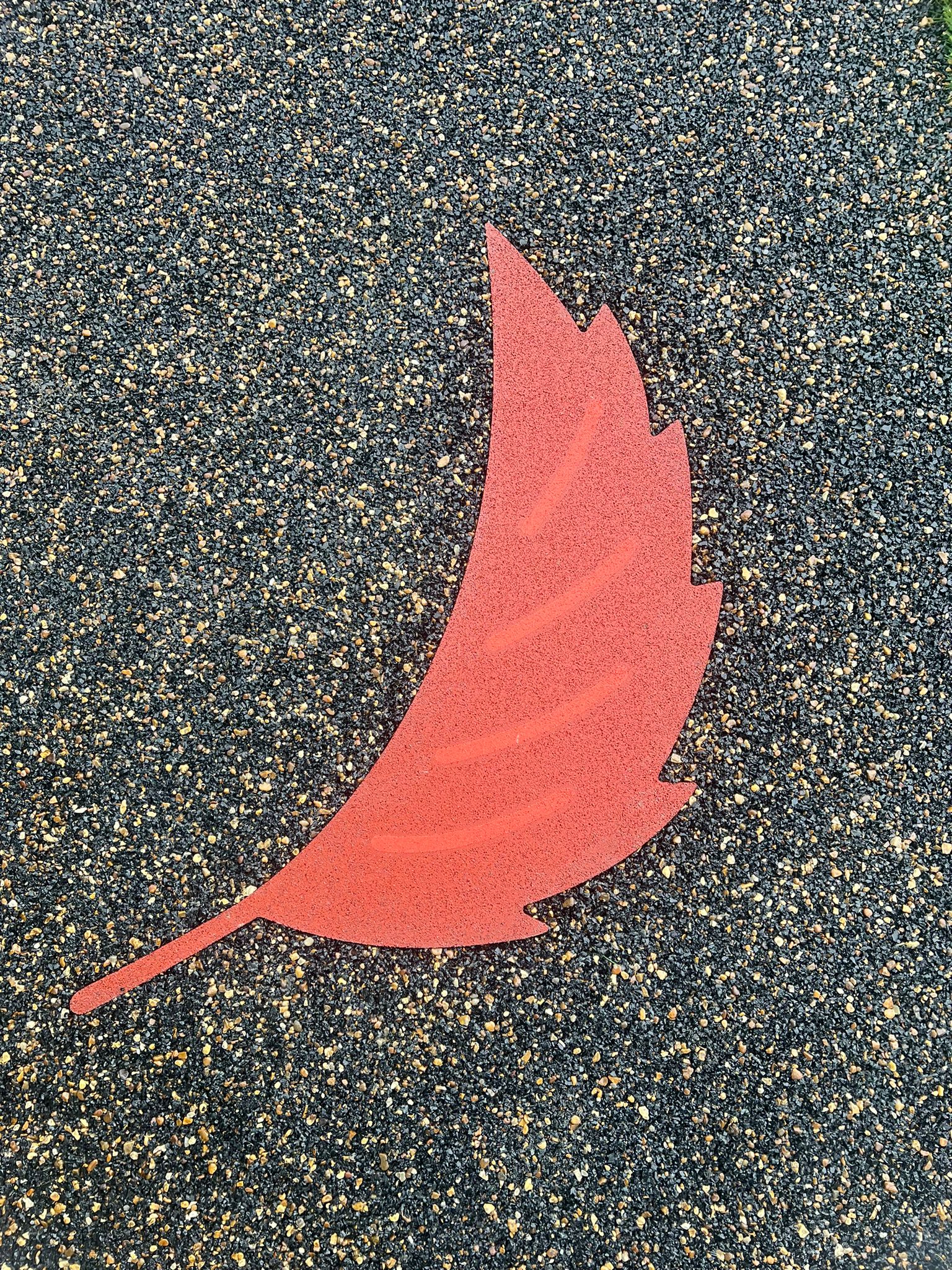 Natural Wet Pour Leaf Designed installed by Precision Timber for a primary school within the UK.